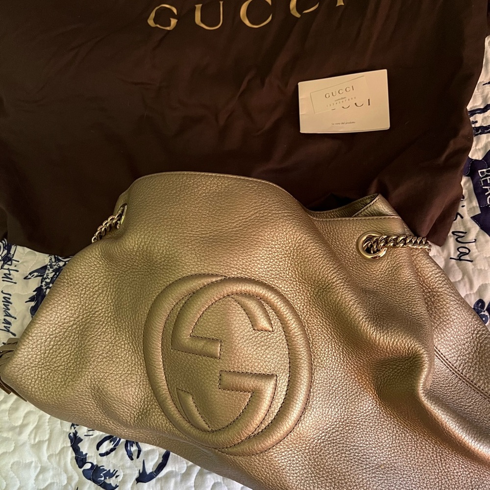 Gucci Gold Shoulder Bag with Structured Design and Gold Hardware